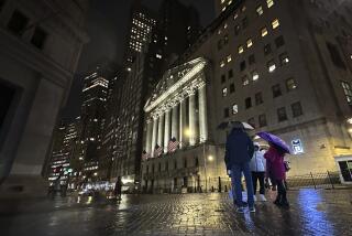 People huddle outside the New York Stock Exchange on Tuesday, Nov. 21, 2023 in New York. World shares were mixed on Wednesday in cautious trading after Wall Street's rally ran out of momentum. (AP Photo/Peter Morgan)