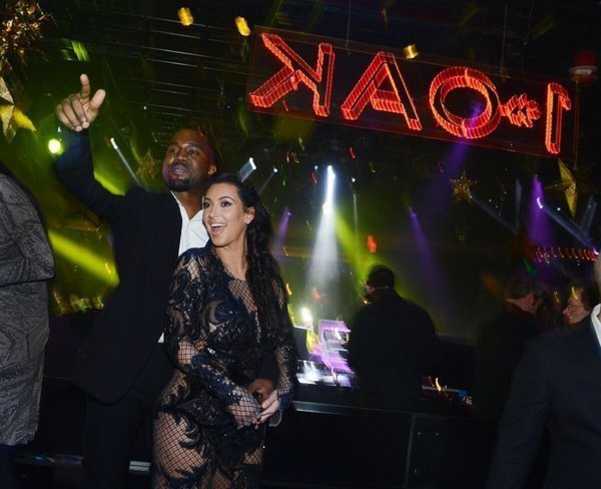 Kanye West and Kim Kardashian celebrate New Year's Eve at the 1 OAK nightclub at the Mirage in Las Vegas.
