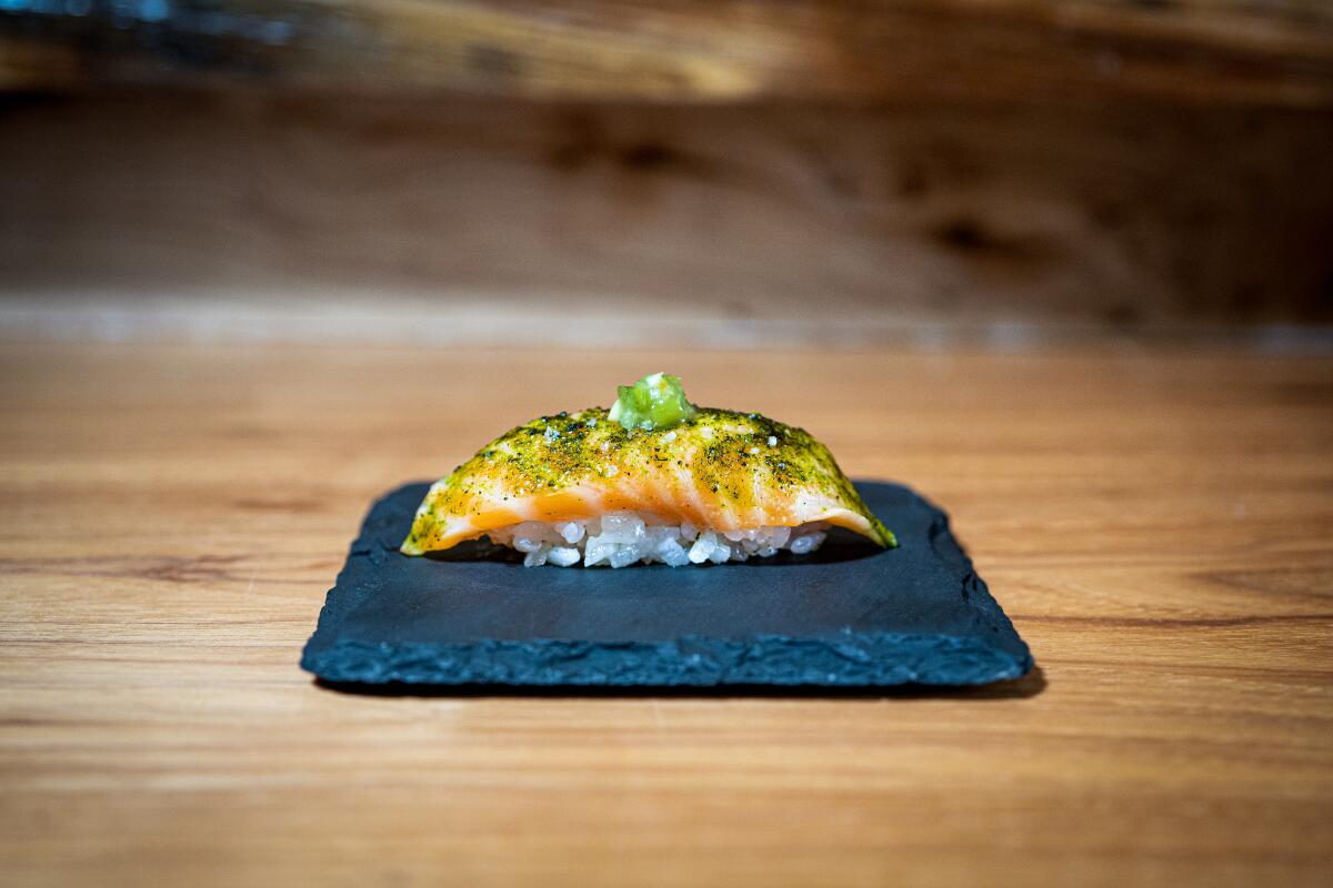 Salmon with matcha salt and pickled wasabi.