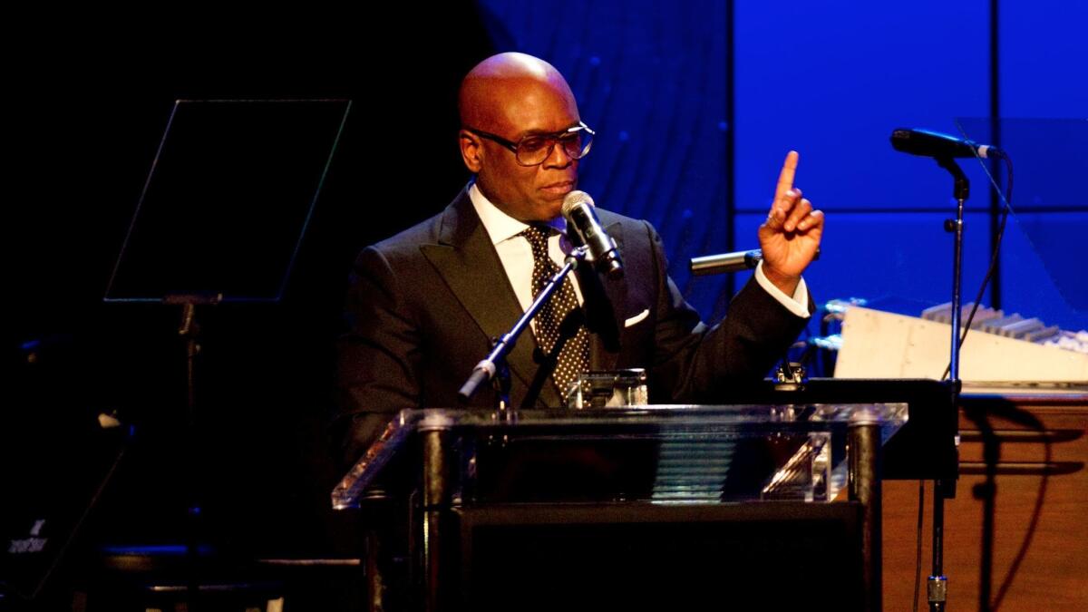 Antonio "L.A." Reid accepts an award at Clive Davis and the Recording Academy's 2013 Grammy Salute to Industry Icons Gala on Feb. 9, 2013, in Beverly Hills.