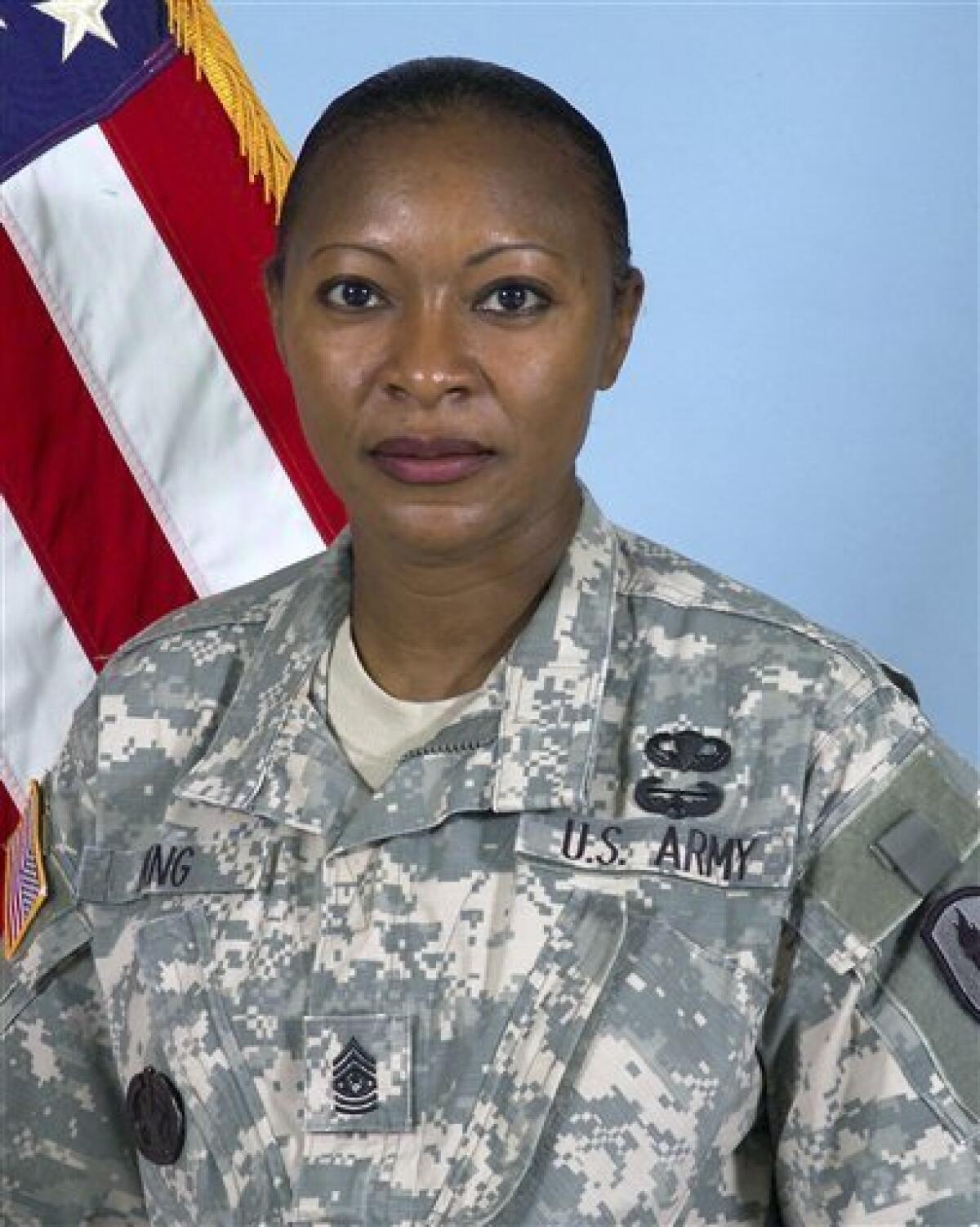 FILE - This is an undated file photo provided by the U.S. Army of Command Sgt. Maj. Teresa King, commandant-select of the U.S. Army Drill Sergeant School at at Fort Jackson, near Columbia, S.C. The Army has suspended Sgt. Maj. Teresa King, the first woman to lead its drill sergeant school, while it investigates an undisclosed personnel matter, the service said Thursday, Dec. 15, 2011. (AP Photo/U.S. Army)
