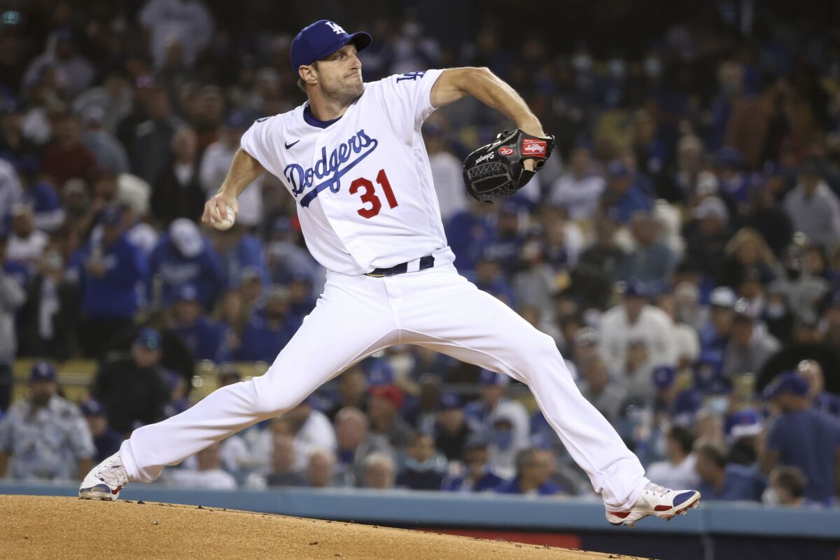 Max Scherzer of the Dodgers pitches against the San Francisco Giants.