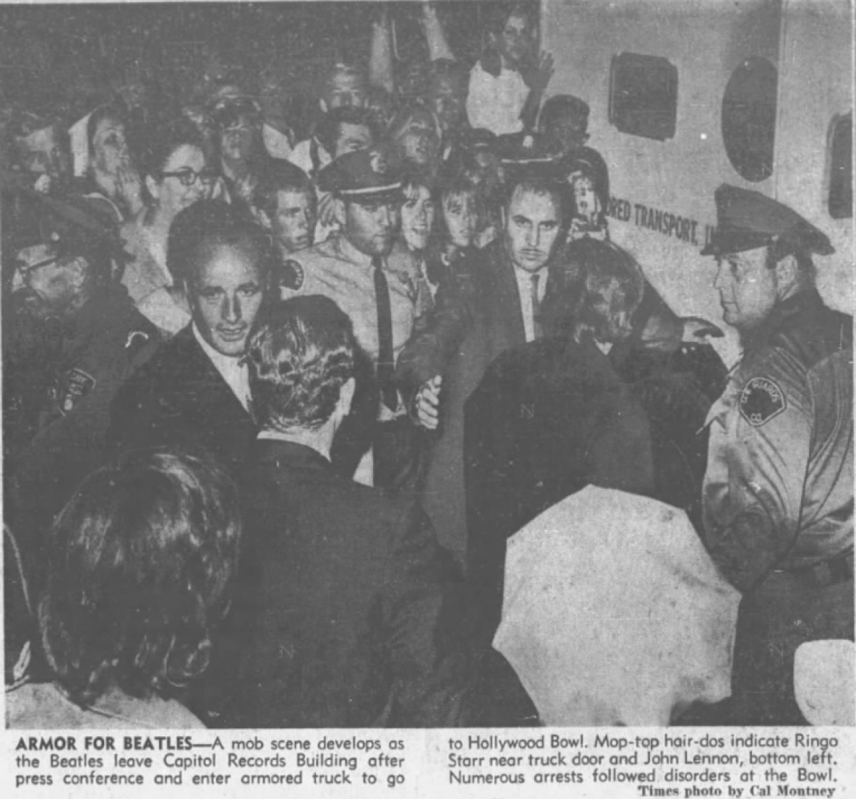 A clip from a newspaper shows a crowd around an armored truck.