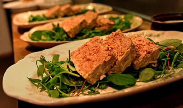 Plates of quail pate at the Corson Building restaurant.
