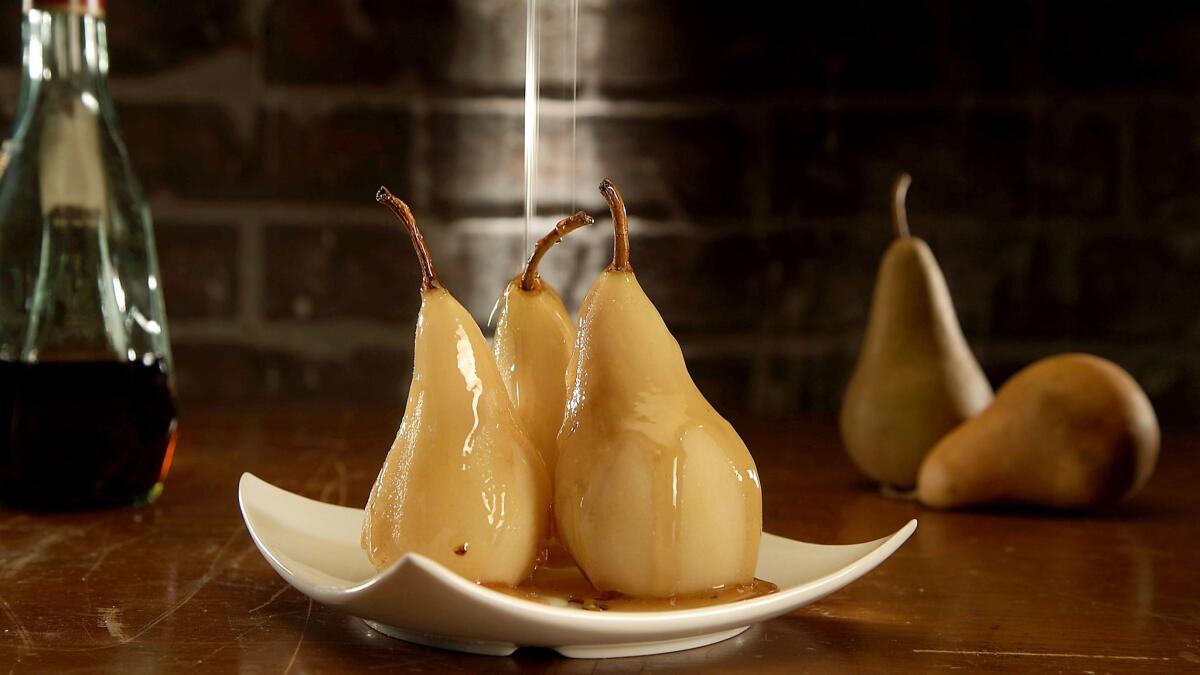 Brandy-poached pears, one of many ways you can use hard alcohol in the kitchen.