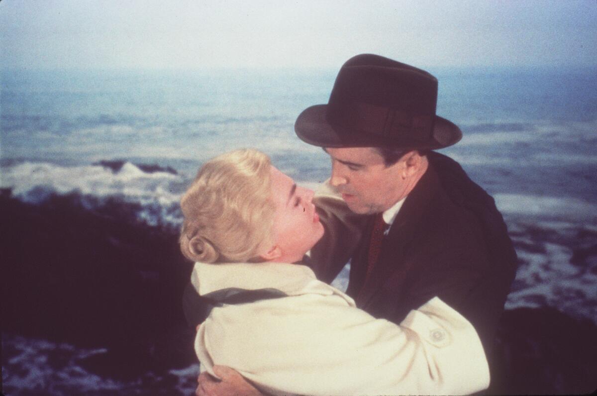 Kim Novak and James Stewart embrace in the movie "Vertigo." 