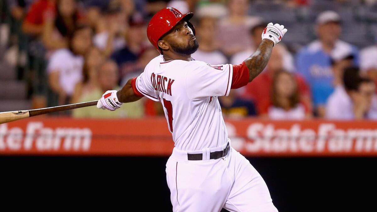 Angels second baseman Howie Kendrick hits a two-run single during the sixth inning of the team's 4-3 win over the Philadelphia Phillies on Wednesday.