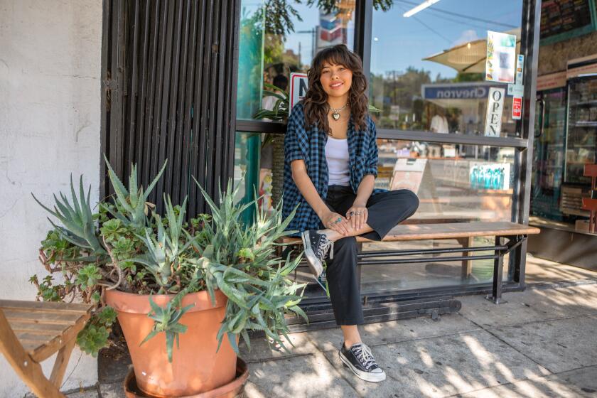 Los Angeles, CA - October 03: Portrait of Mexican American actor Xochitl Gomez, who appeared in Netflix's "Baby-Sitters Club" and as America Chavez in MCU's "Doctor Strange and the Multiverse of Madness," on Monday, Oct. 3, 2022, in Los Angeles, CA. (Francine Orr / Los Angeles Times)