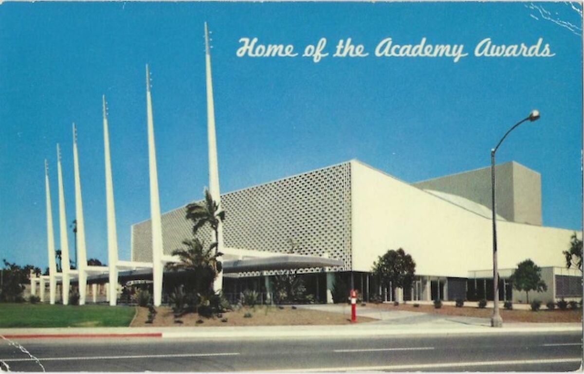 Exterior view of Santa Monica Civic Auditorium. Text: Home of the Academy Awards