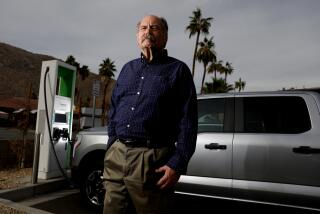 PALM SPRINGS , CA - JANUARY 19: Ralph Megna (cq), of Landers, owner of a 2023 Ford F-150 Lightning electric pickup, is upset about the sad state of public charging, at a Electrify America charging station on Friday, Jan. 19, 2024 in Palm Springs , CA. The State of California has spent more than a billion dollars on a public charging system that is unreliable, and so instead of encouraging EV ownership, works against it. (Gary Coronado / Los Angeles Times)
