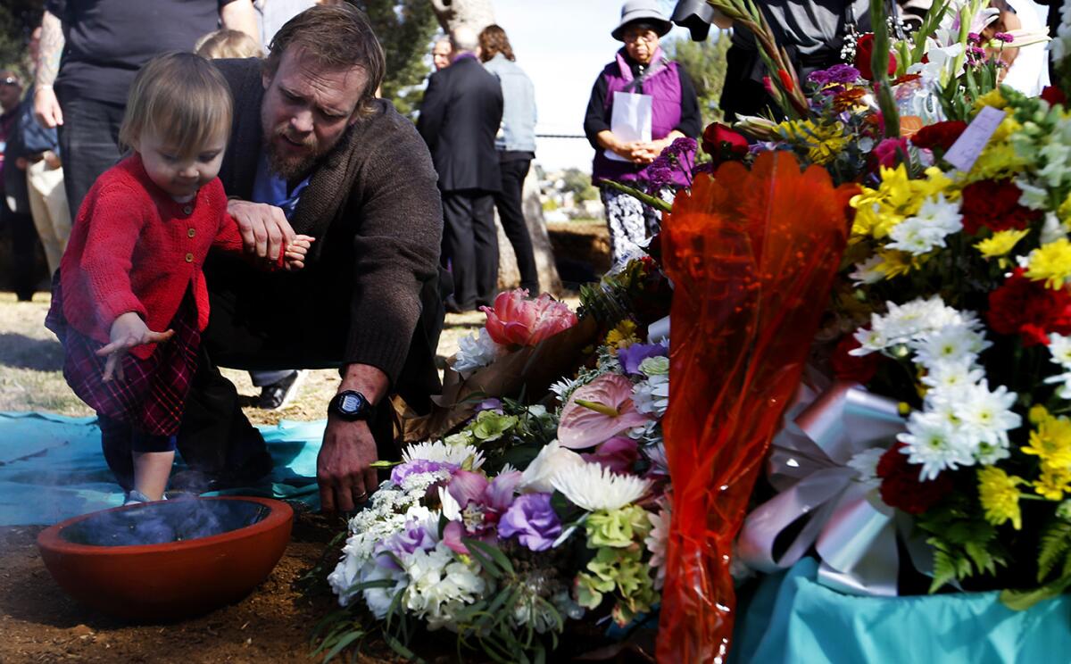 Abraham Kinney, right, with his daughter Simone Kinney, attend Wednesday's ceremony.