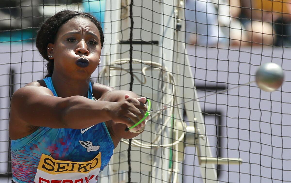 Hammer thrower Gwen Berry is seeking an apology after being put on probation for raising a fist on the medal stand last year.