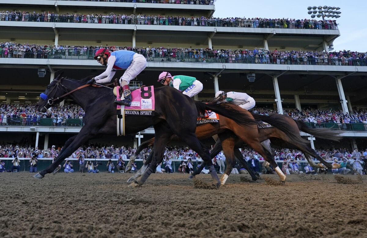 Medina Spirit leads at the Kentucky Derby this month