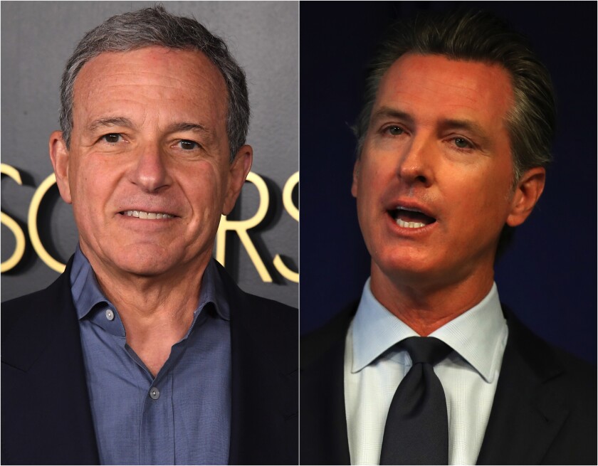 Walt Disney Co. Executive Chairman Bob Iger, left and Gov. Gavin Newsom.