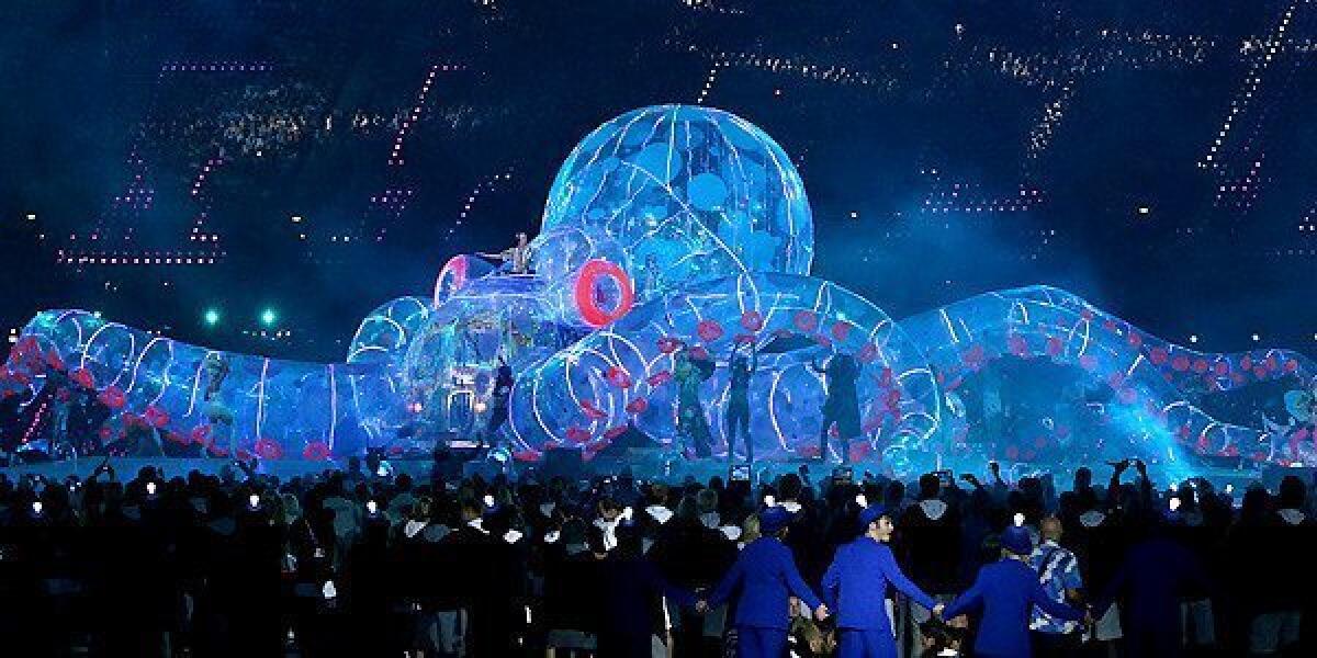 Fatboy Slim performs in an electronic inflatable octopus at the London 2012 Olympics closing ceremony.