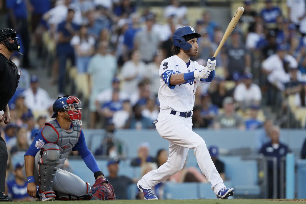 The Dodgers' Cody Bellinger watches his game-winning, pinch-hit solo homer with two outs in the ninth inning Saturday.