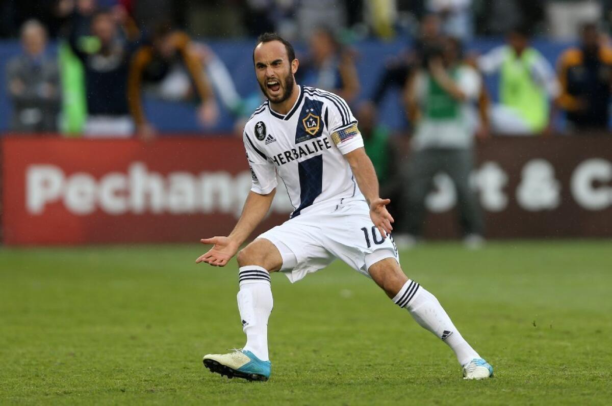 Landon Donovan celebrates during the Galaxy's 3-1 MLS Cup win over the Houston Dynamo on Dec. 1, 2012.