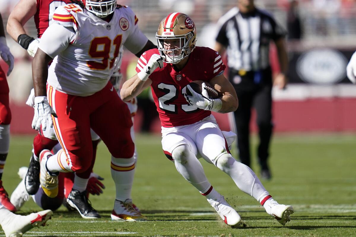 San Francisco 49ers running back Christian McCaffrey carries the ball against the Kansas City Chiefs on Oct. 23.
