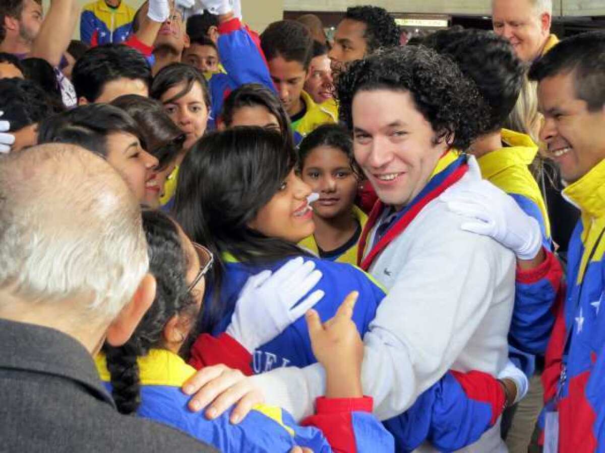 Gustavo Dudamel greets a throng of students in Caracas, Venezuela, in February.