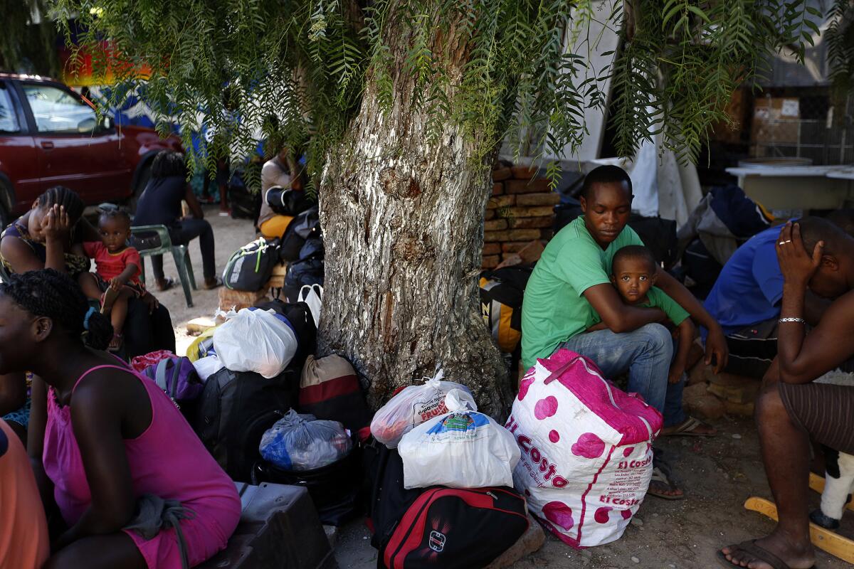 Haitian migrants crowd Tijuana's shelters, budget hotels and rooms-for-rent, where they spend days waiting for appointments with American immigration officials.
