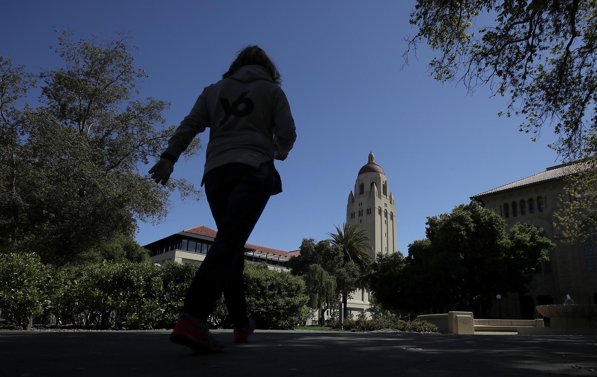 Hoover Tower is shown at rear on the campus at Stanford University.