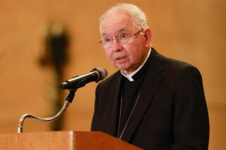 Los Angeles Archbishop José H. Gomez speaks at a lectern.