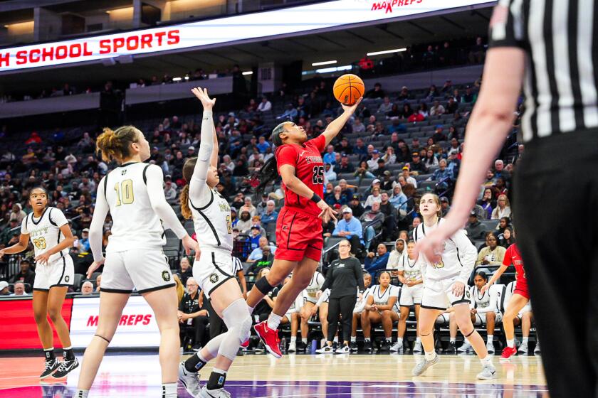 Aliyahna Morris of Etiwanda goes up for shot against Mitty in Open Division state championship game. She scored 12 points.