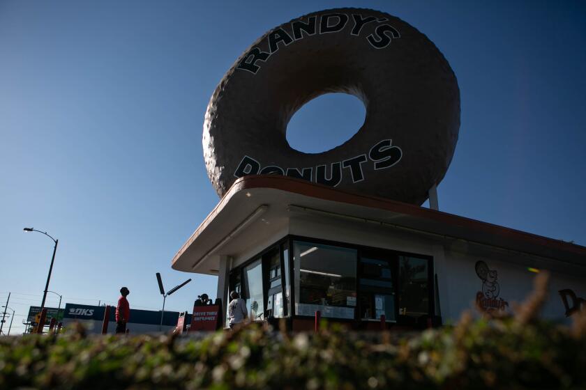 INGLEWOOD, CA - OCTOBER 14: The iconic Randy's Donuts in South LA on Wednesday, Oct. 14, 2020 in Inglewood, CA. (Jason Armond / Los Angeles Times)