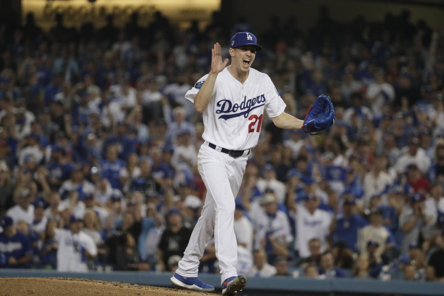 Dodger pitcher Walker Bueller reacts after striking out Red Sox's J.D. Martinez in the 4th inning.