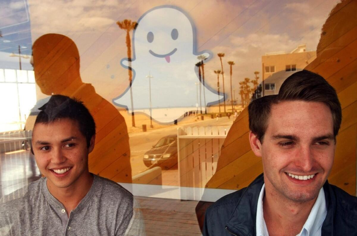 Snapchat has raised $50 million in funding from Coatue Management. Above, co-founders Bobby Murphy, left, and Evan Spiegel in Venice.