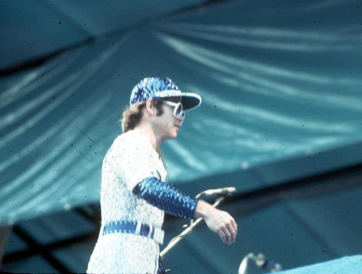 Elton John is shown performing at his 1975 Dodger Stadium 