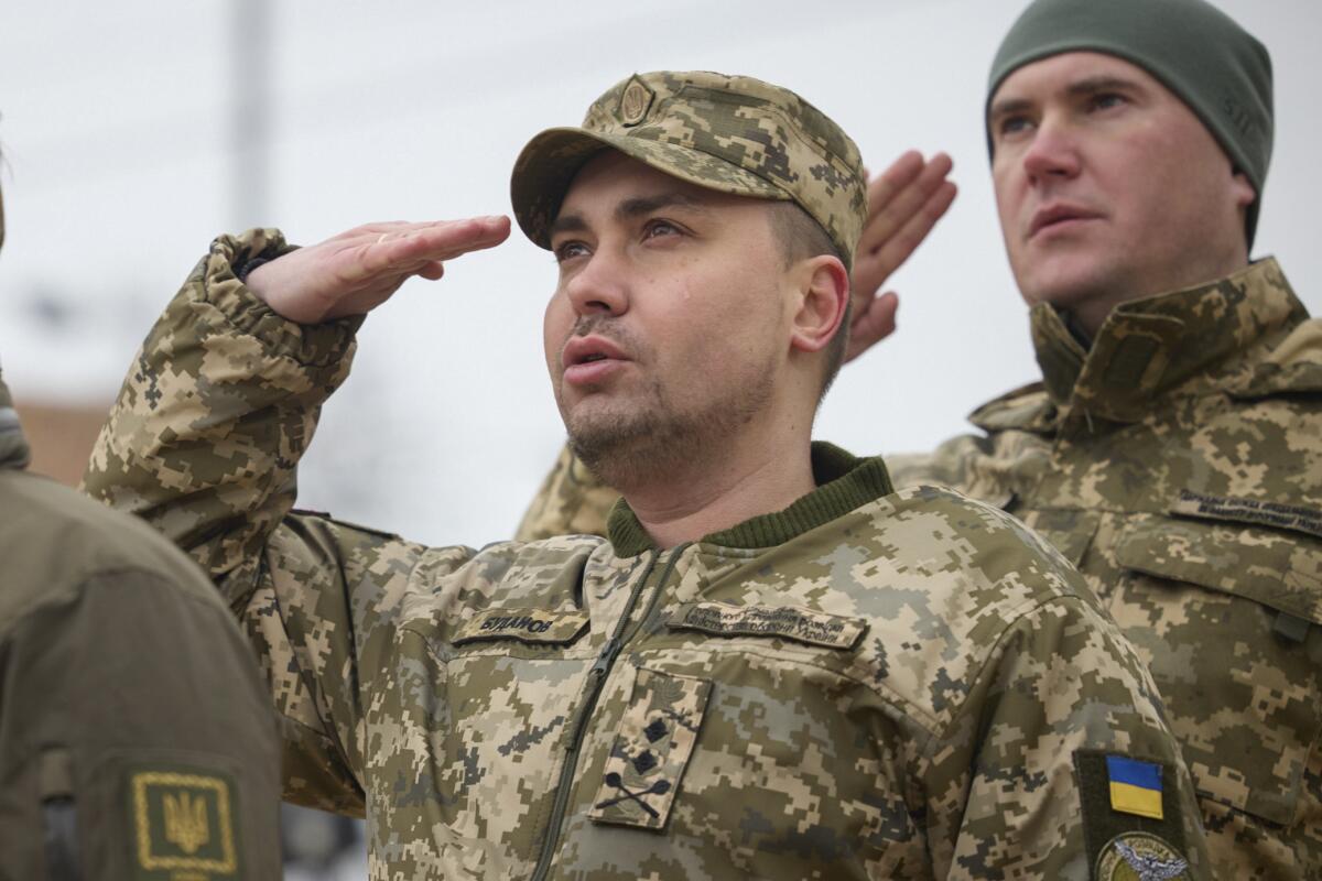 Maj. Gen. Kyrylo Budanov, Ukraine's military intelligence chief, center, attends a commemorative event.