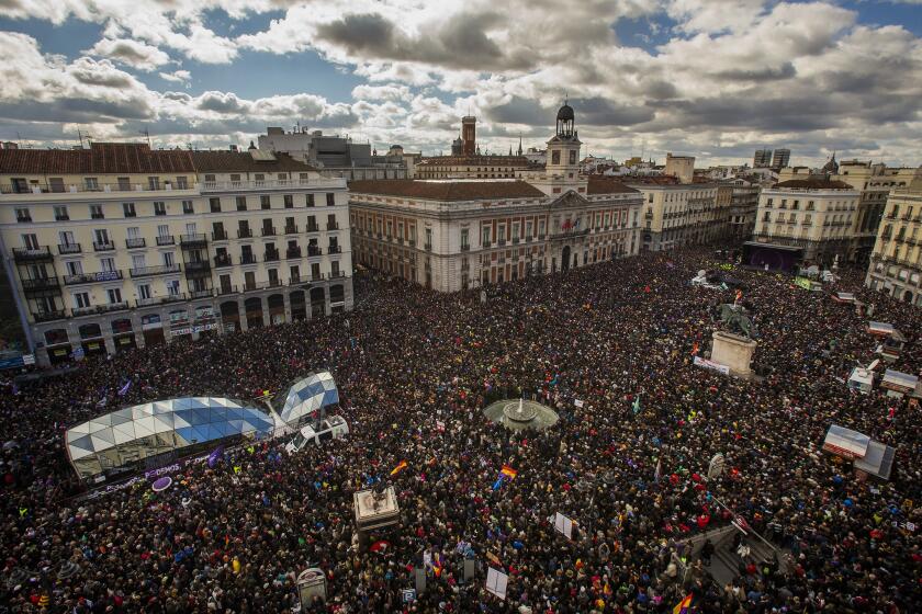 FILE - People gather in the main square of Madrid during a far-left United We Can party march in Madrid, Spain, Jan. 31, 2015. Spanish Prime Minister Pedro Sanchez's snap general election breaks apart the coalition he built with the far-left United We Can party, marking a line in the sand with a movement born from grassroots activism whose electoral fortunes have nosedived. (AP Photo/Andres Kudacki, File)