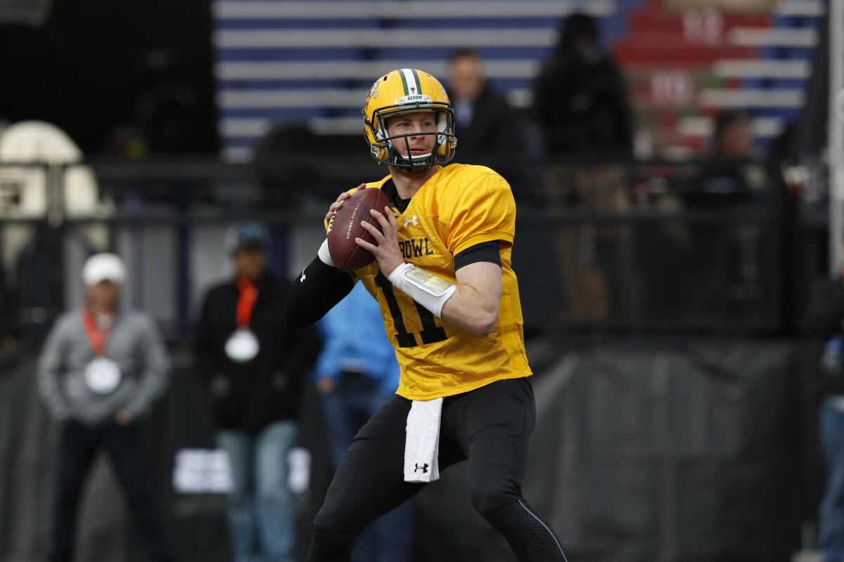 North Dakota State quarterback Carson Wentz runs through drills during a Senior Bowl practice on Jan. 28.