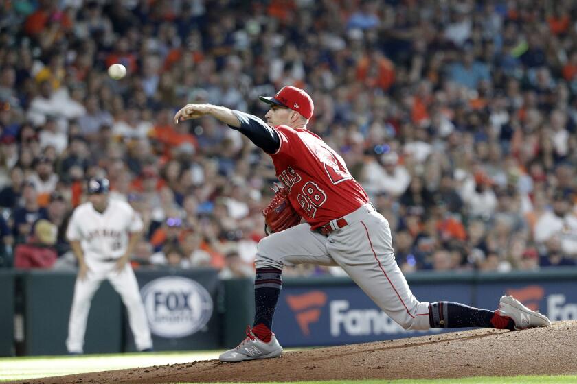 Los Angeles Angels starting pitcher Andrew Heaney throws against the Houston Astros during the first inning of a baseball game Saturday, July 6, 2019, in Houston. (AP Photo/David J. Phillip)