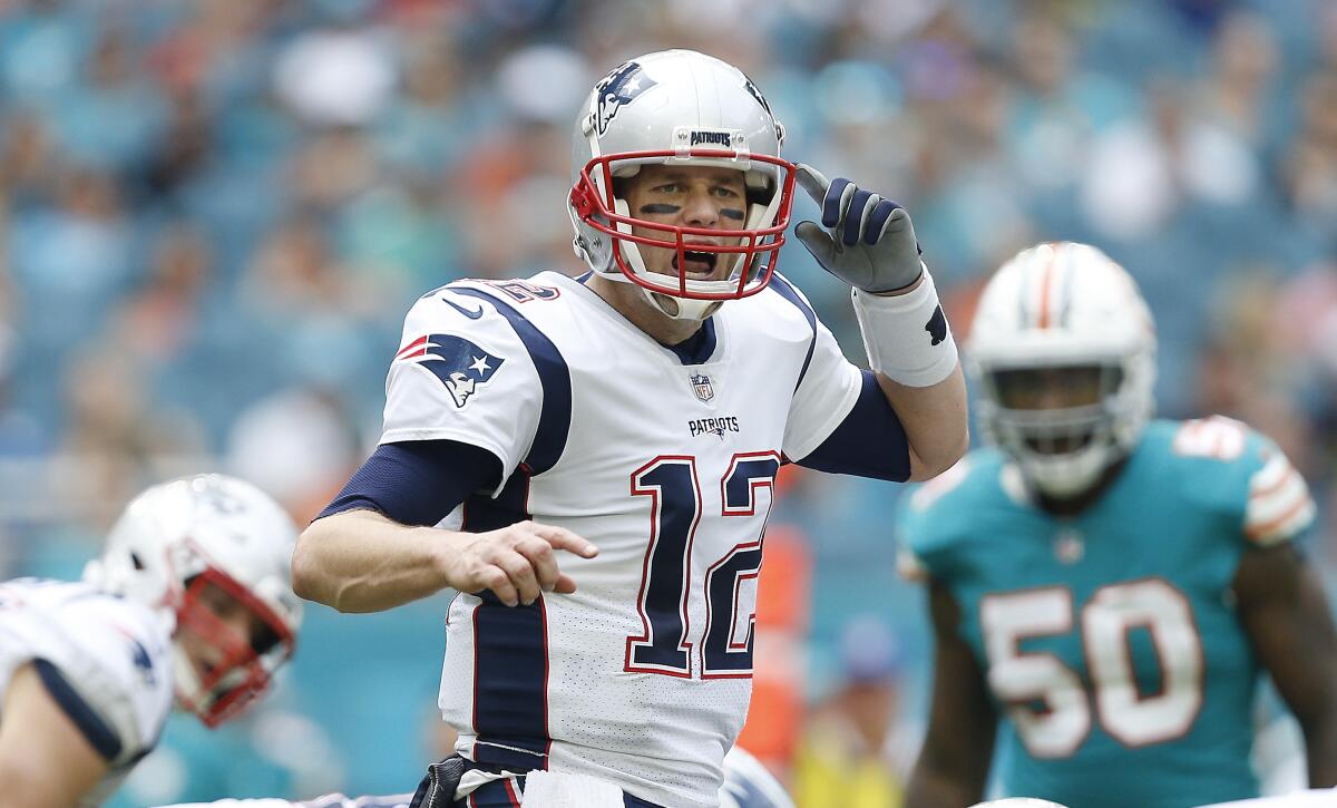 New England Patriots quarterback Tom Brady calls out a play.