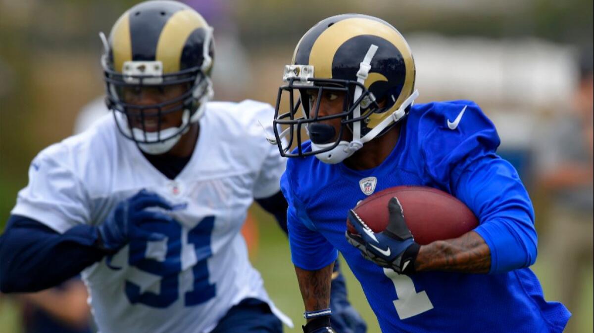 Receiver Tavon Austin runs with the ball during a June 1 practice in Oxnard.