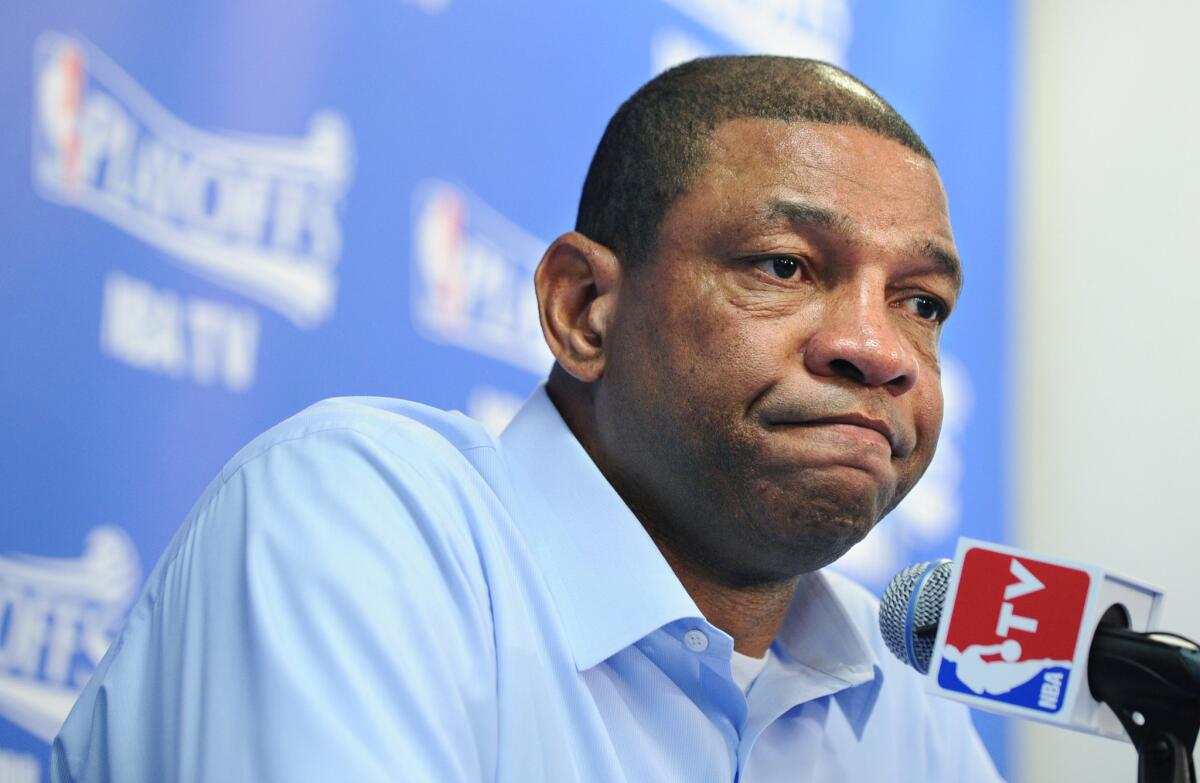 Clippers Coach Doc Rivers, above, might resign if Donald Sterling remains the team's owner, interim CEO Dick Parsons testified Tuesday.