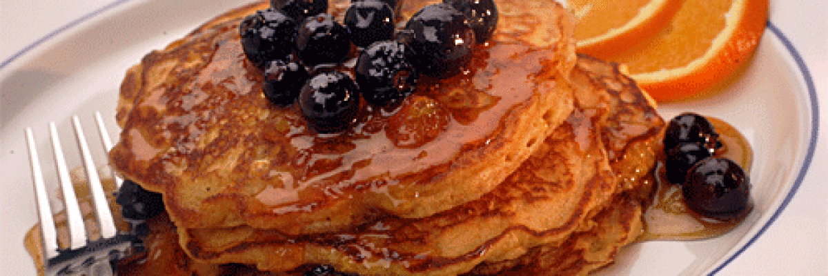Blueberry sauce tops the malt-enriched corn pancakes at Doughboys in Los Angeles.