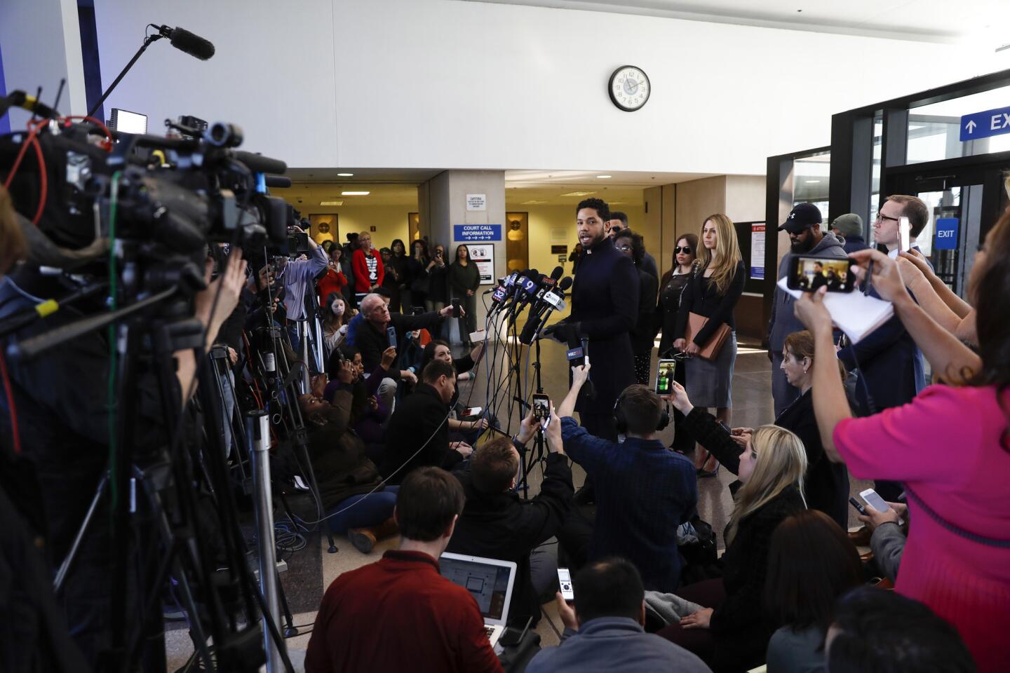 Jussie Smollett speaks to the media after all charges against him are dropped at the Leighton Criminal Court Building in Chicago on March 26, 2019.