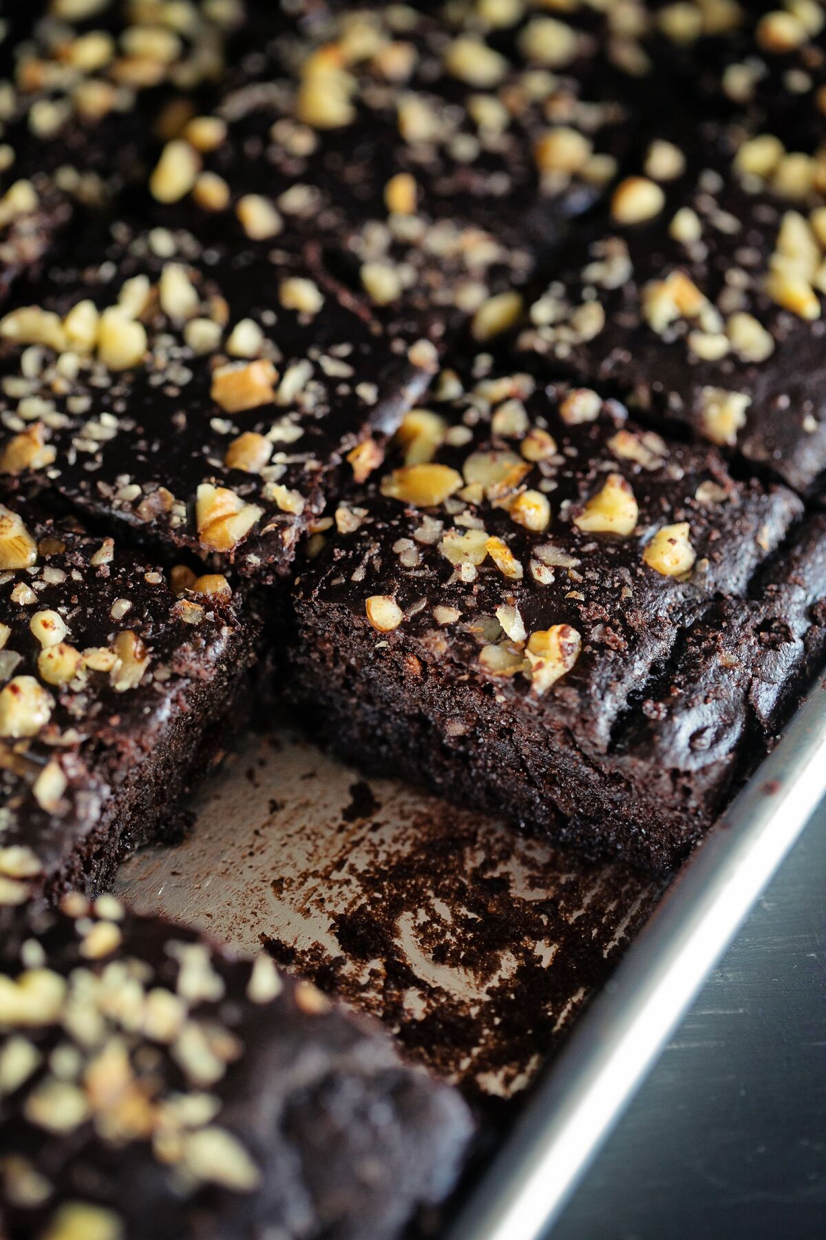A pan of nut-topped brownies.