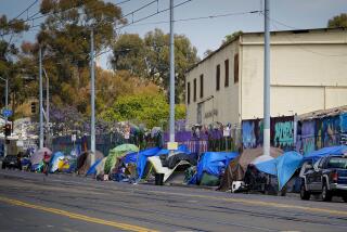 Downtown, San Diego, CA - May 18: On Wednesday, May 18, 2022 in San Diego, CA., rows of tents along Commercial Street in downtown San Diego. (Nelvin C. Cepeda / The San Diego Union-Tribune)