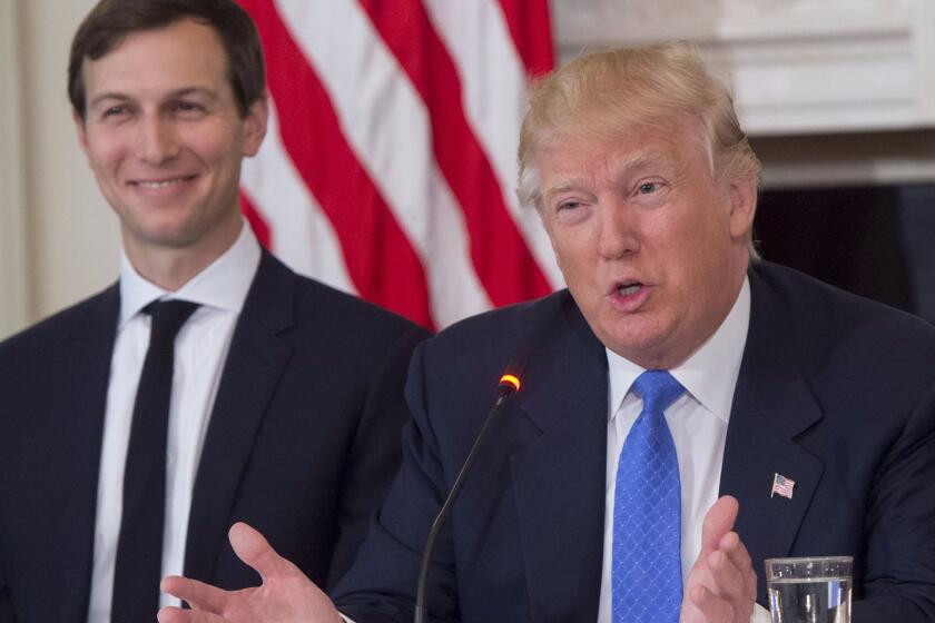 (FILES) This file photo taken on February 23, 2017 shows US President Donald Trump alongside White House Senior Advisor Jared Kushner (L), during a meeting with manufacturing CEOs in the State Dining Room at the White House in Washington, DC. US President Donald Trump has tapped son-in-law Jared Kushner to lead a new White House office, that aims to apply ideas from the business world to help streamline the government, the Washington Post reported March 26, 2017. The White House Office of Innovation is to be unveiled Monday with sweeping authority to overhaul the bureaucracy and fulfill key campaign promises like reforming care for veterans and fighting opioid addiction, the Post said. / AFP PHOTO / SAUL LOEBSAUL LOEB/AFP/Getty Images ** OUTS - ELSENT, FPG, CM - OUTS * NM, PH, VA if sourced by CT, LA or MoD **