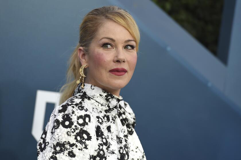 Christina Applegate, in black and white gown, at the Screen Actors Guild Awards at the Shrine Auditorium on Jan. 19, 2020