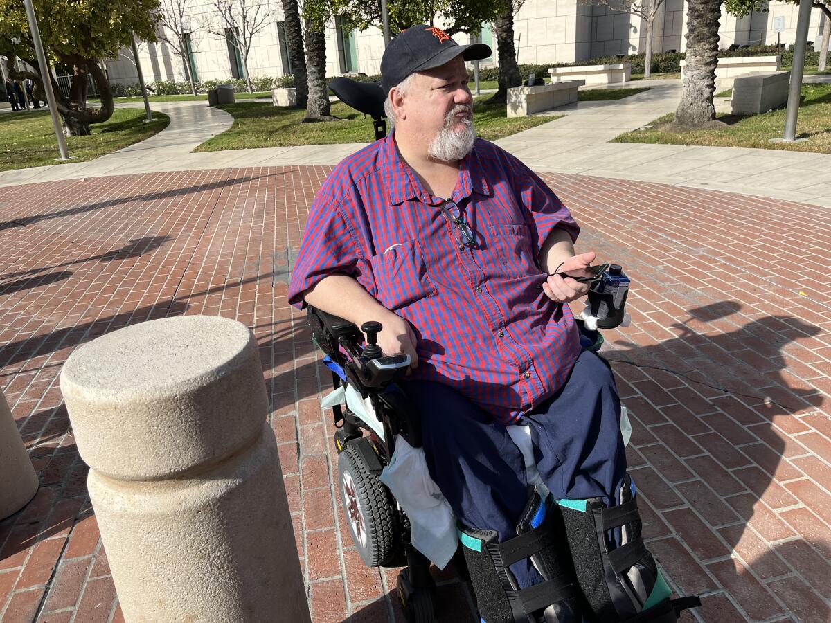 Geoffrey Ernest Johnson in his wheelchair