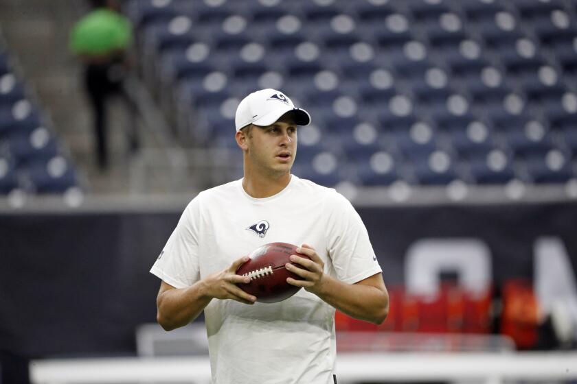 Los Angeles Rams quarterback Jared Goff warms up before a preseason NFL football game against the Houston Texans Thursday, Aug. 29, 2019, in Houston. (AP Photo/Kevin M. Cox)
