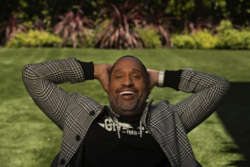 ENCINO, CA-APRIL 16, 2020: "Black-ish" creator Kenya Barris is photographed at his home in Encino. The successful writer who has never acted in his life, is the star of the new family comedy on Netflix, "#blackAF", in which he plays a version of himself-a rich, successful writer grappling with six kids and with being constantly misunderstood. (Mel Melcon/Los Angeles Times)