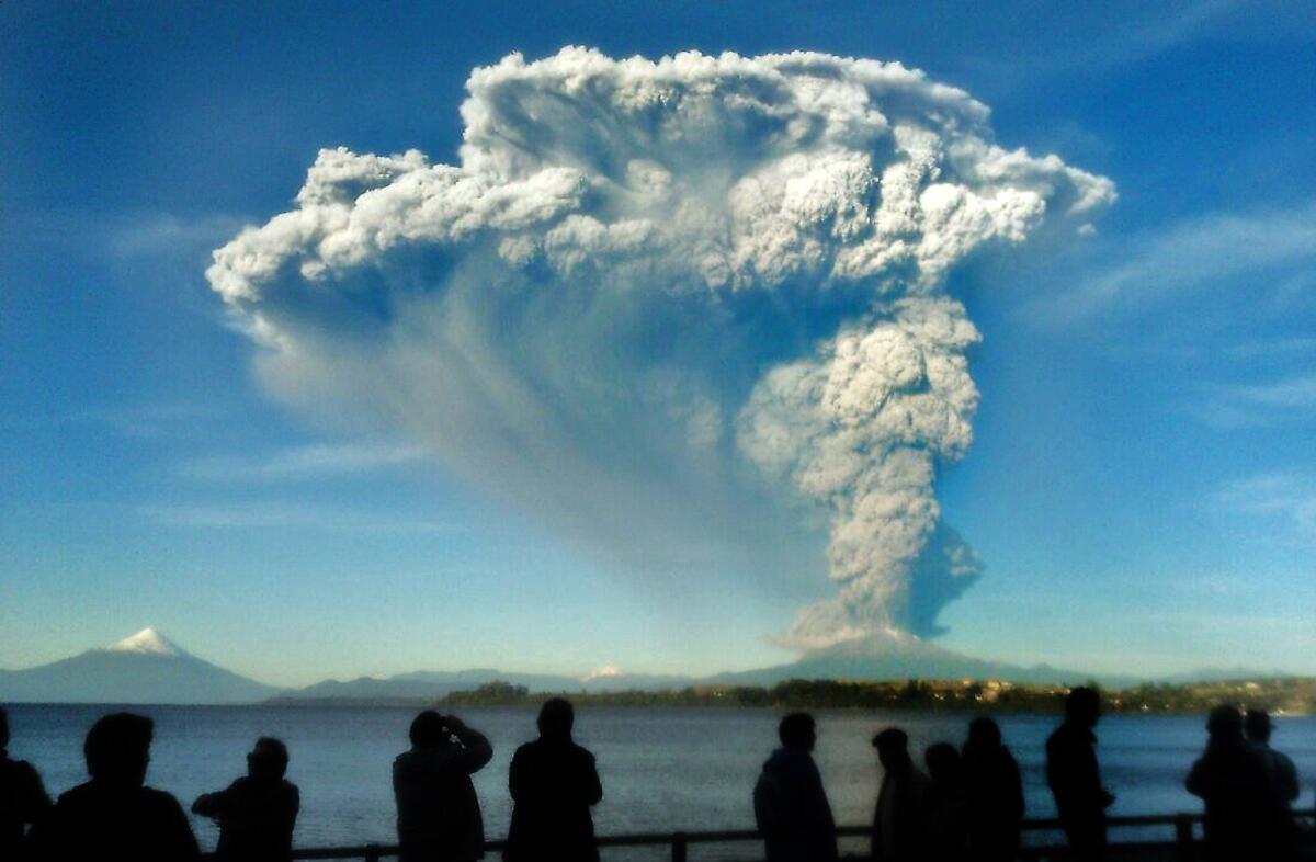 People in Puerto Varas, Chile, watch the eruption of the Calbuco volcano Wednesday.