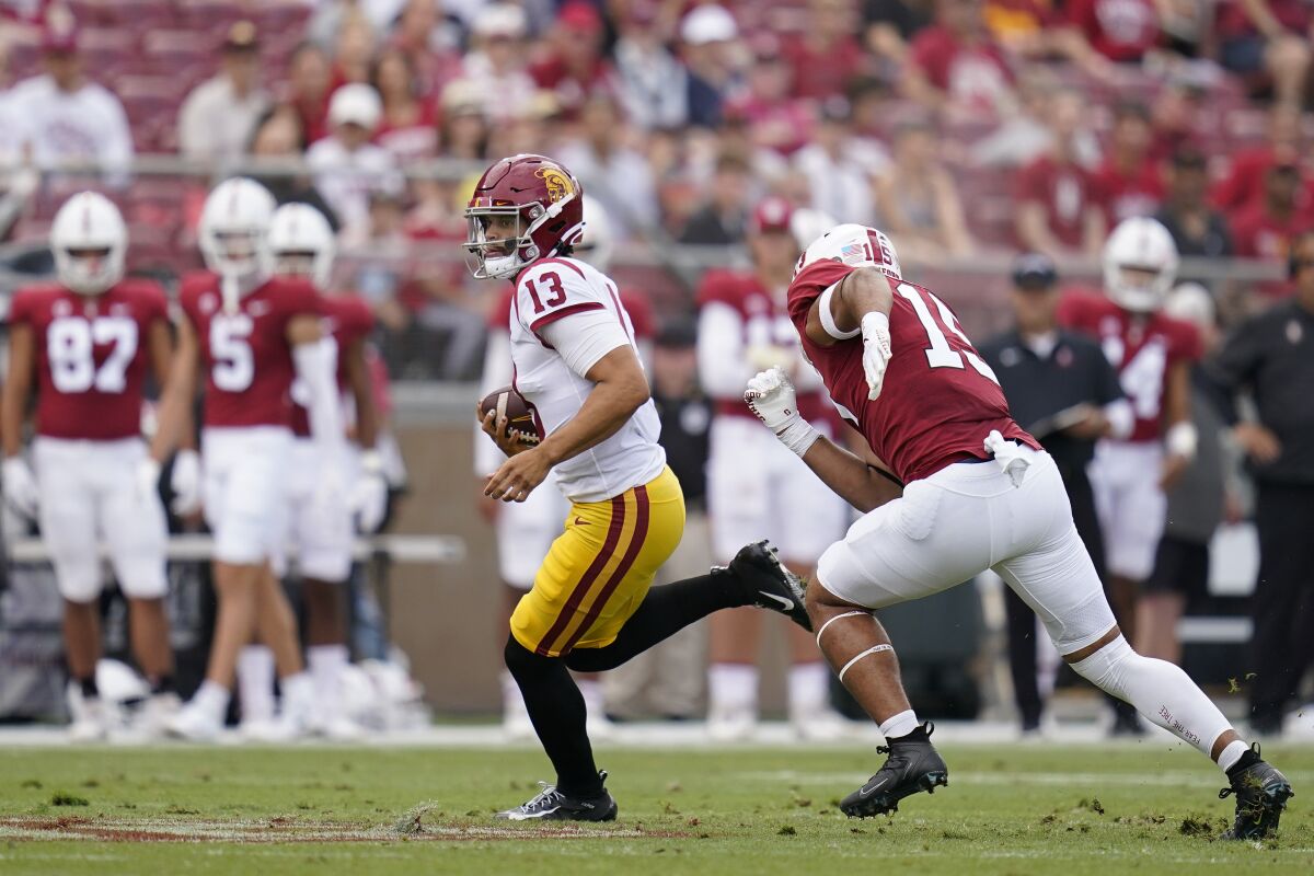USC quarterback Caleb Williams runs the ball during the first half against Stanford.