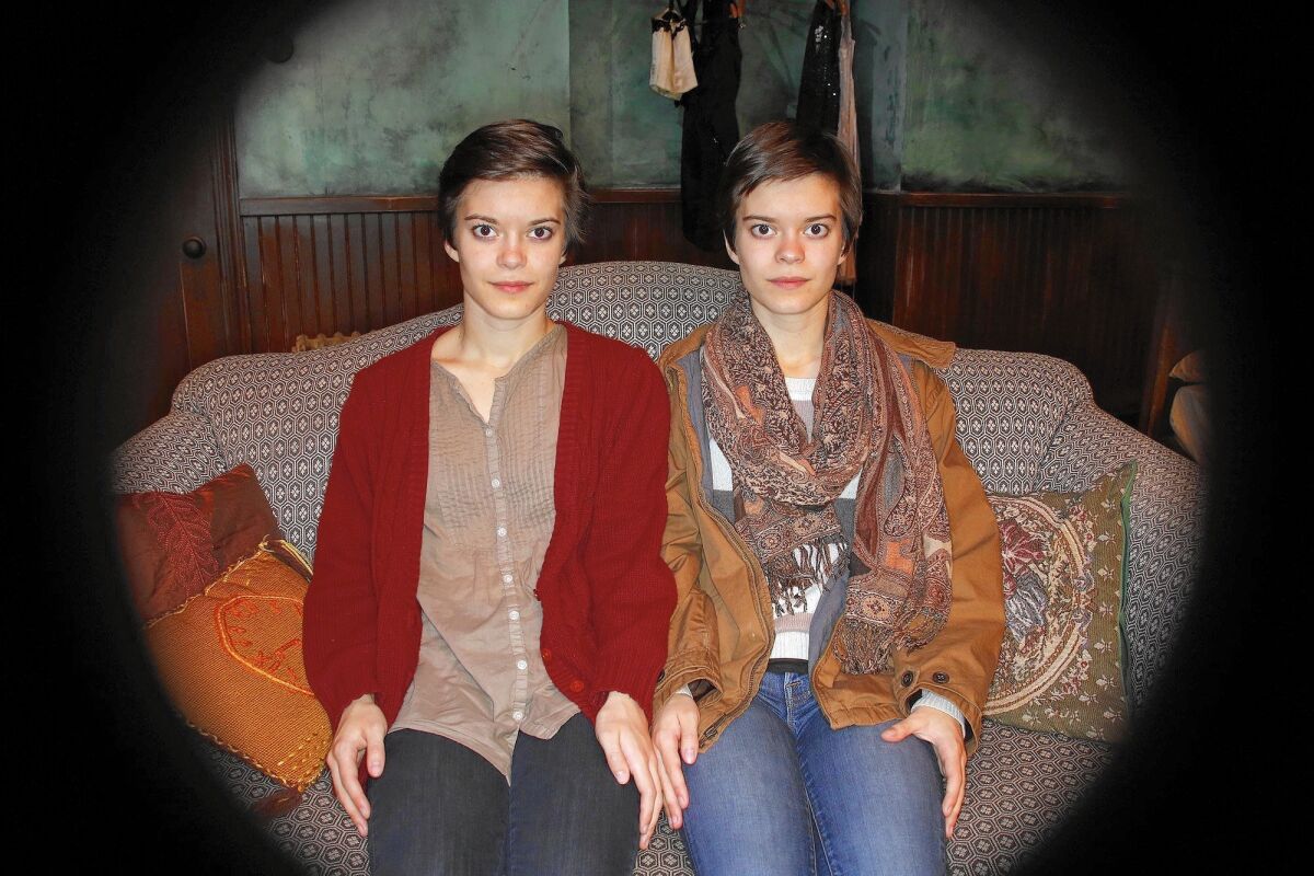 Emily Hinkler, left, and her identical twin Elizabeth star in "My Sister," set in pre-World War II Berlin. Elizabeth plays Matilde, who has cerebral palsy and writes material for Emily's Magda to perform in a cabaret.